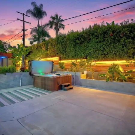 Family-friendly summer vacation home with big hot tub 2 blocks from beach.