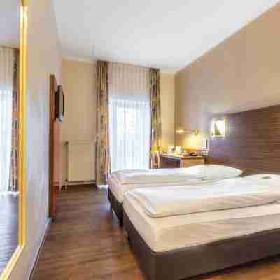 Sport- Und Tagungshotel de Poort Rooms