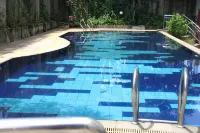 RedLiving Apartemen Gunung Putri Square - Abidin Room Tower Pinus