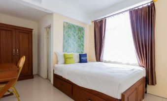 Urbanview Erga Family Residence Syariah Surabaya by RedDoorz