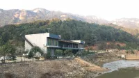 Luofu Mountain Lixin Plantation Apartment Отели рядом с достопримечательностью «Летающая крыша»