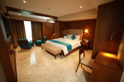 Yash International Hotels near Krishna Menon Museum