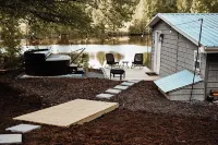 Cozy Lakefront Cottage with Hot Tub on 25-Acre Private Retreat