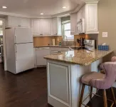 Cheerful 4 bedroom home with  heated pool & lake views