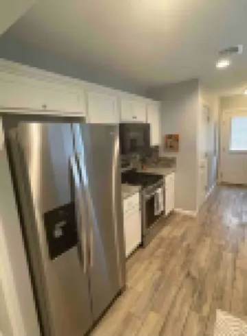 Perfect Oasis. NEW Home Away from Home with COVERED PARKING-Close to everything