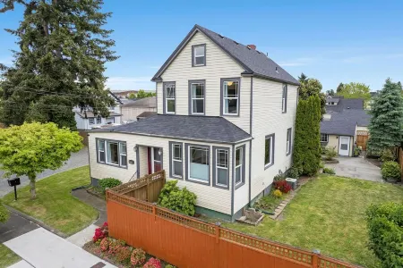 Family compound in North Tacoma!  Large house, guest house, game room, koi pond!