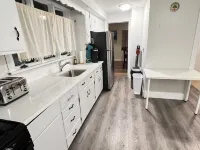 Charming 2 bedroom house 5 miles from Logan Airport/ Boston. Walking to train.