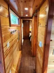 Near Pictured Rocks and trails, On the Au Train River, has private hot tub