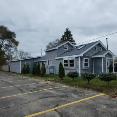 Cabin in Oscoda with hot tub and game room