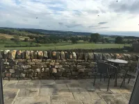 Pretty cottage with enclosed patio and private hot tub with stunning veiws