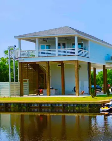 Boating, Fishing, Kayaking and more at this NEW Waterfront Bay St. Louis Retreat
