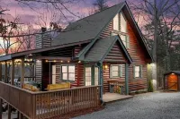 Escape to our luxe, pet-friendly Blue Ridge cabin—sleeps 14 with top amenities!