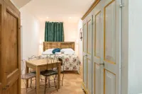 ديلا آسيسي رومز