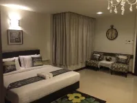 Dino Studio Hotels near Wat Burapa Sang Ming
