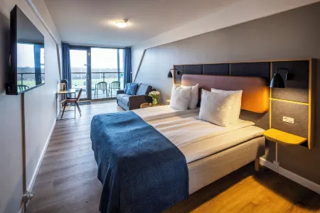 Idrættens Hus Hotel og Konference Отели рядом с достопримечательностью «Аркен»