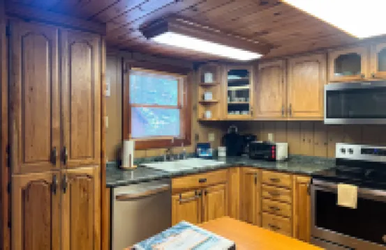 Picture-perfect cabin with private hot tub, deck space, fireplace, & more