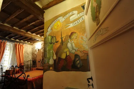 Antica Corte dei Principi Charming Rooms Отели рядом с достопримечательностью «Базилика Сан-Микеле-ин-Форо»