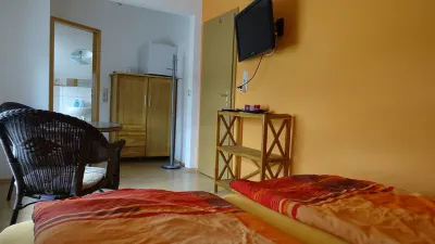 Gästezimmer & Ferienwohnung Berge Hotels in Wilthen