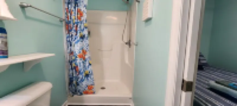 Cozy studio with AC, WiFi, and pool - just steps from the beach