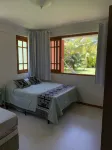 First floor apartment, garden view, peace and quiet for you in Praia do Forte Hotels in Praia Do Forte
