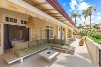 Royal Beach House with sea view and large community pool.