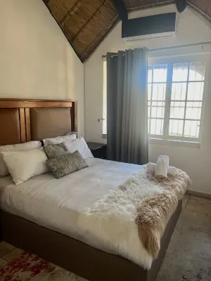 Serene Thatched Roof Retreat in Faerie Glen, Pretoria