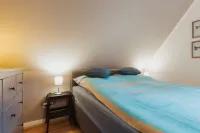 The modern apartment - Rosenhain 12, No. 6 - is located 800 meters from the sea. Hotel a Timmendorfer Strand