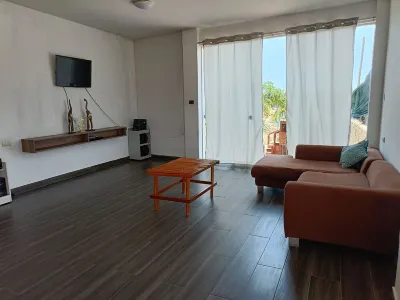 Casa En Asia Отели в г. 