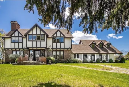 Private Tudor style 5 bedroom home in country setting.
