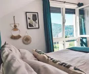 Luxurious villa surrounded by greenery with breathtaking views of the city Hotels in 