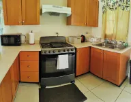 Hidden Gem, Cozy 2-bedroom house with WiFi, AC, Private Pool In Portmore Hotels in Hellshire