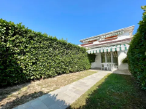 Casa a schiera con giardino privato