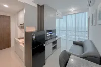 Combined Grey Toned 2BR Apartment at The City Square Surabaya By Travelio