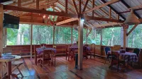 Private forest view cabin w/AC, 2 beds-restaurant and car rental on site.