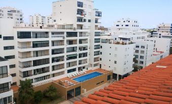 Apartment with One Bedroom in Quarteira, with Wonderful City View and Furnished Terrace