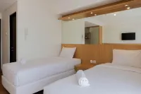 Twin Bed Studio Room at Annora Living Apartment Hotels in Sukasari