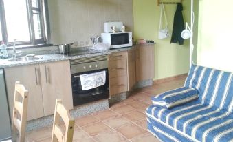 2 Bedrooms House with Furnished Garden and Wifi at Grandas de Salime