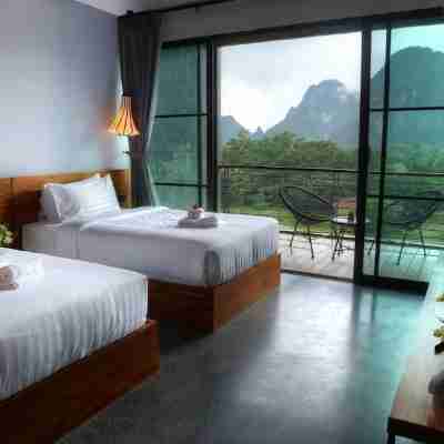 萬榮因提拉酒店 Rooms