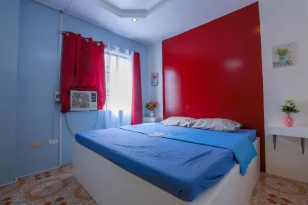 Tala Apartelle Отели рядом с Аэропорт Д. З. Ромуальдес