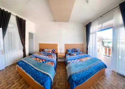 Homestay Lidah Buaya 3 Syariah Hotels near Sikidang Crater