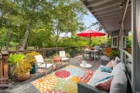 Riverfront cottage w/ hot tub, lush gardens, privacy & river access, pets ok!