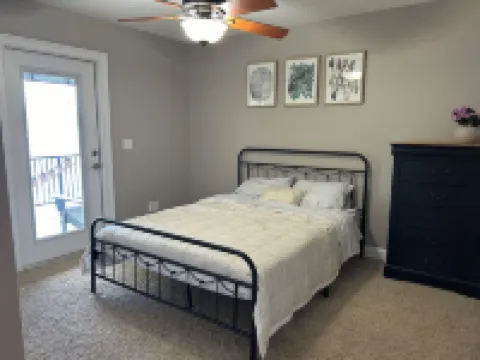 Lakeside Retreat~ Large home with pool, dock, game room and balcony on lakefront