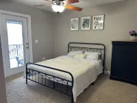 Lakeside Retreat~ Large home with pool, dock, game room and balcony on lakefront