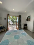 Luxury, self contained, airconditioned studio with private terrace & use of pool