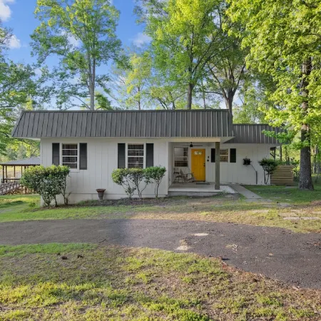 Newly Renovated Lakefront home with boat house, launch and 2 piers!