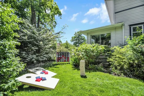 Grill, Game Room, Fire Pit! Walk to ND. Family-Sized Historic Home!
