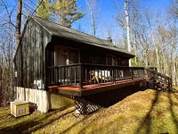 Camp Creaky Birch, cozy 2-bedroom cabin with privacy, firepit and deck.