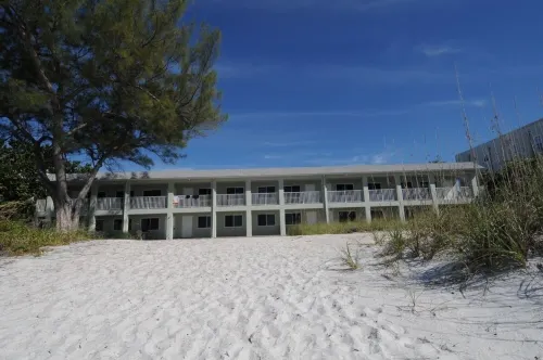 Completely remodeled beach front condo with full ocean views, steps to the water
