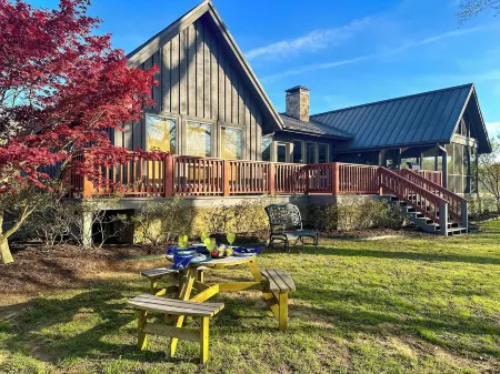 Riverfront Bliss- Private River Dock, Hot Tub & Two King rooms!