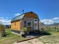 Tiny mountain house with country views